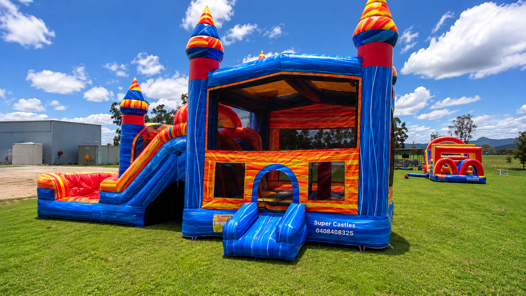 Multicoloured wet and dry combo jumping castle with slide